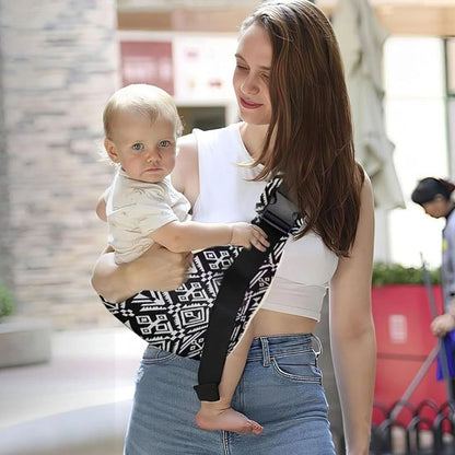 bébé confortable dans écharpe de portage bébé