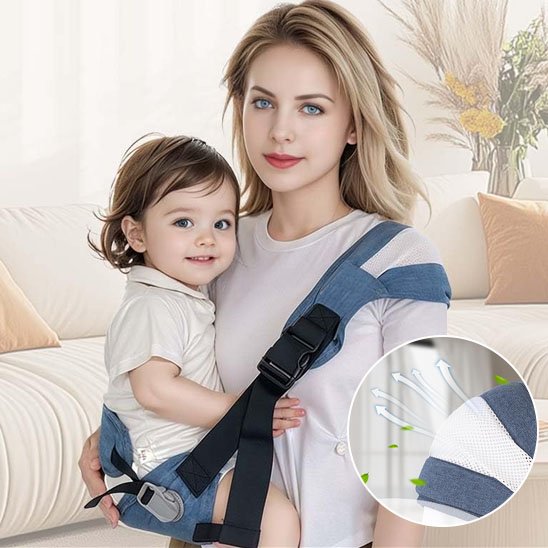 bebe souriant dans echarpe de portage