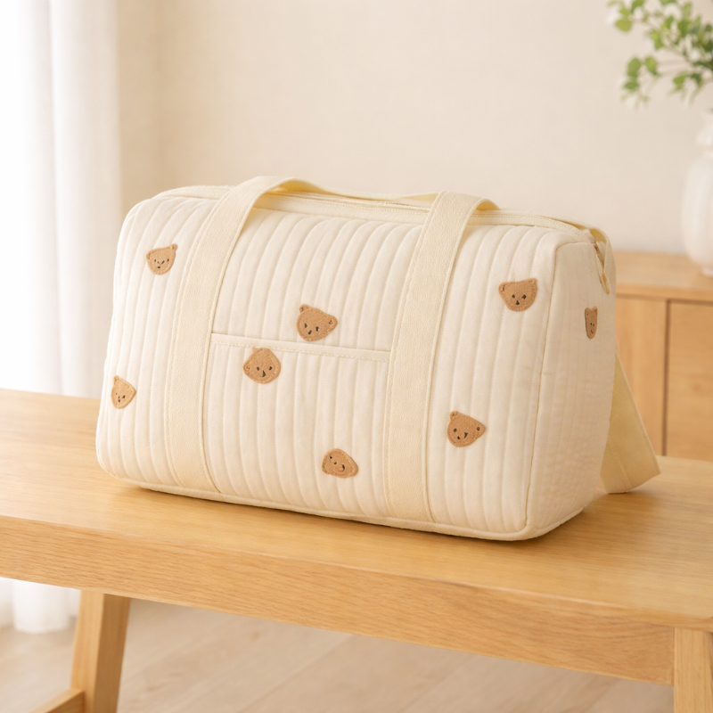 sac à langer bébé maman confort sur banc